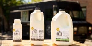  Milk in front of Truck. 
